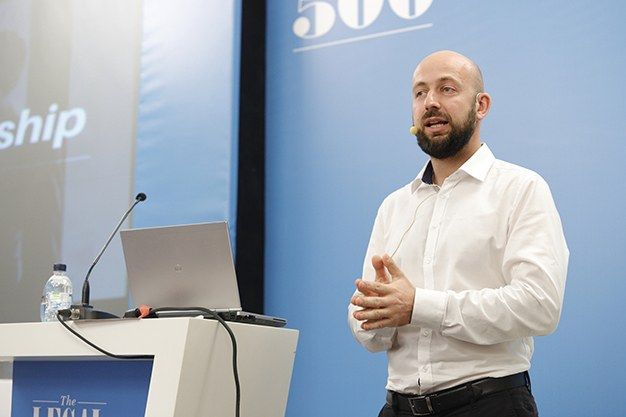 Alexander Balabanov speaking at a legal-industry leadership summit